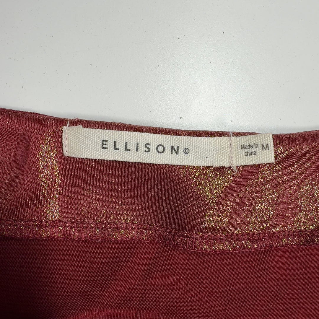 Burgundy metallic shift dress back view showing relaxed fit and knee-length hem