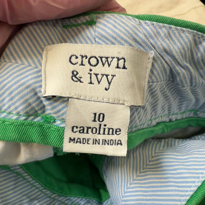 Tag view of green shorts by Crown & Ivy showing rear pockets and flattering fit on size L