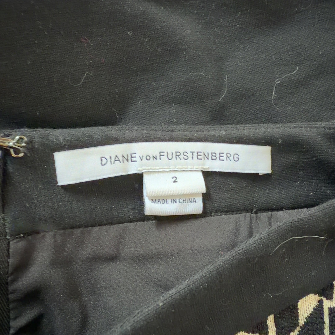 Black and cream geometric pencil skirt by Diane von Furstenberg, back view on model