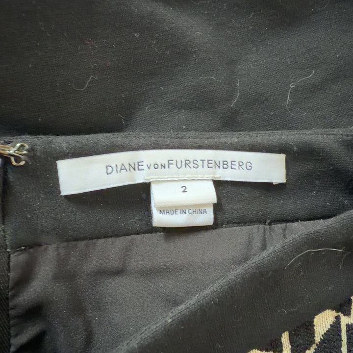 Black and cream geometric pencil skirt by Diane von Furstenberg, back view on model