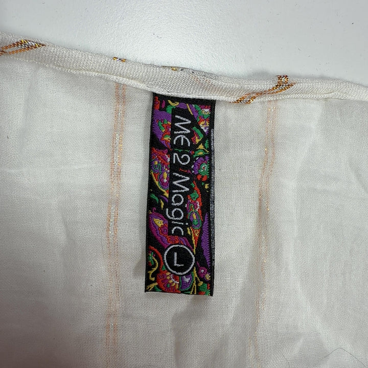 Tag view of cream viscose maxi dress showing tie closure and flowing tiered lace panels