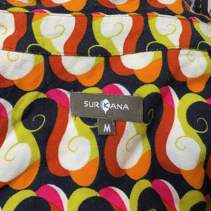 Tag view of multicolor abstract print Surkana shirt showing relaxed fit and full pattern design