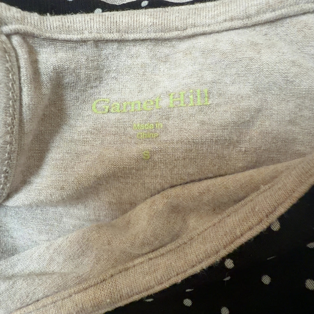 Cream long sleeve top with black polka dot collar detail, back view