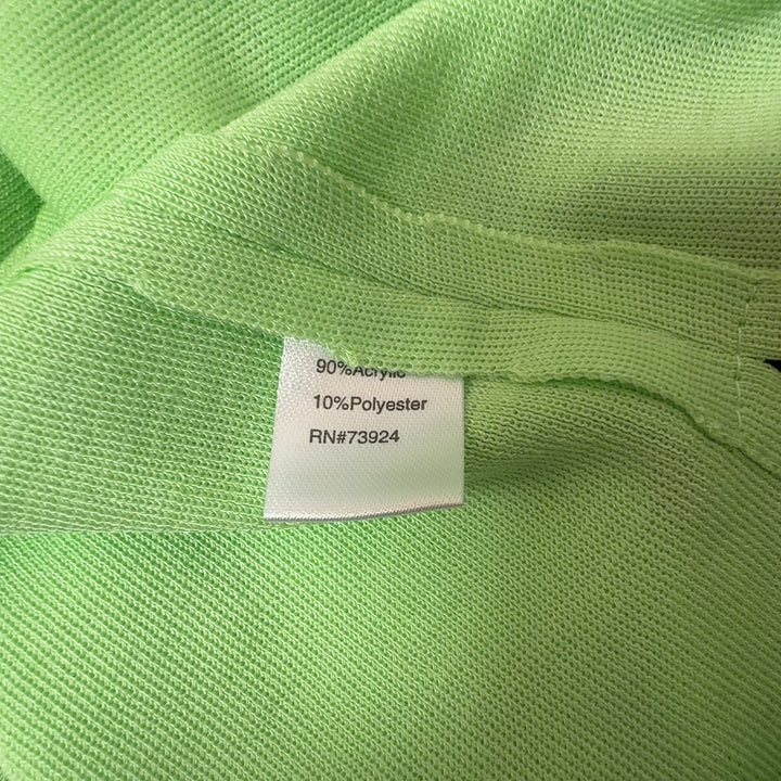 Green v-neck sleeveless knit tank top by MING WANG, back view on model