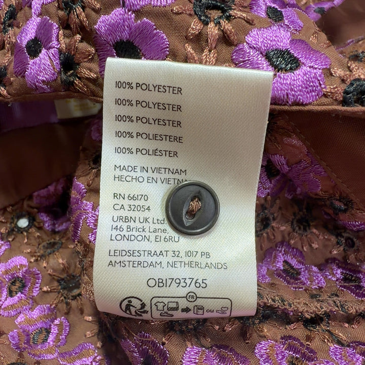 Purple floral print sleeveless collared top by Maeve with button-front design, back view