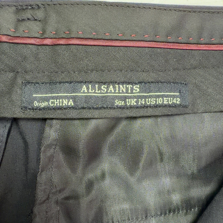 Black cropped dress pants from Allsaints, back view displaying the tailored fit and refined construction of the premium fabric