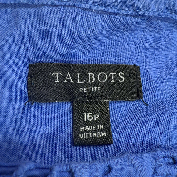 Blue eyelet cotton top with puff sleeves, back view