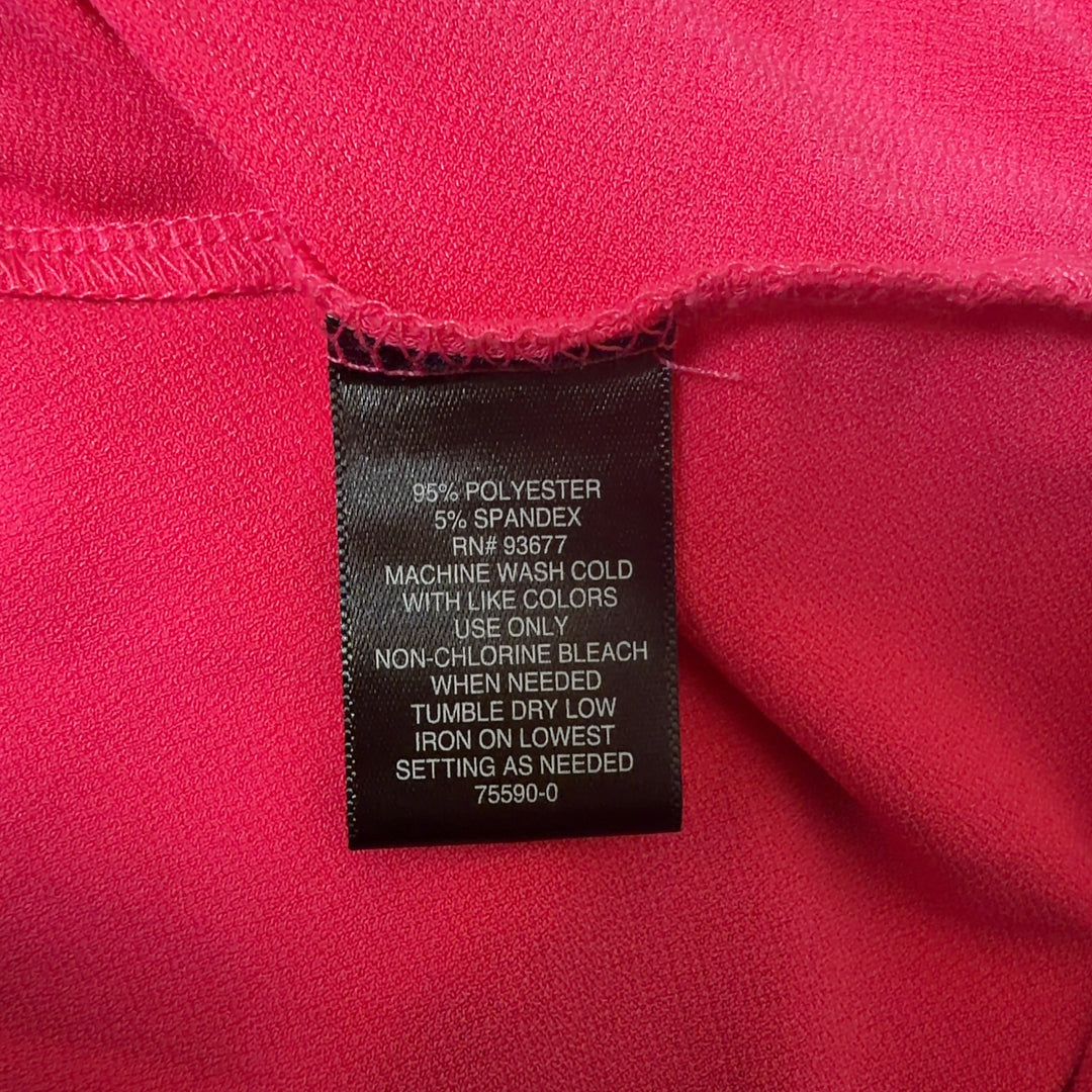 Pink cold shoulder top with back tie detail and three-quarter sleeves, back view