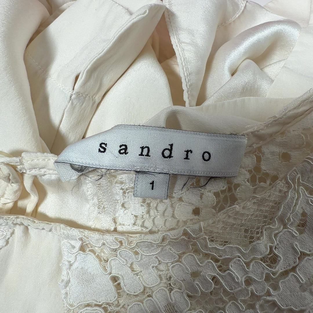 Cream Sandro blouse with lace neckline detail, back view on model