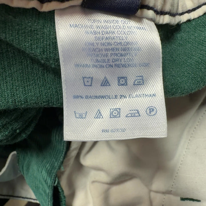 Tag view of green corduroy wide-leg pants from Lands' End showing relaxed fit and full-length inseam