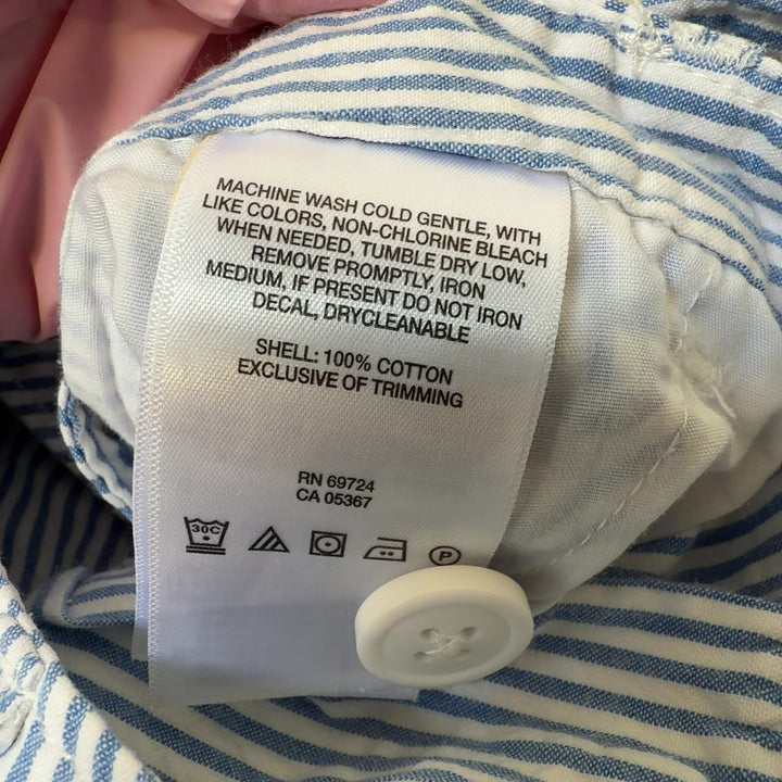 Tag view of blue and white striped cotton shorts by Columbia with functional pockets