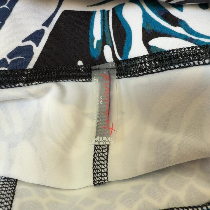 Multicolor abstract print athletic shorts back view displaying high-waisted fit and full pattern coverage