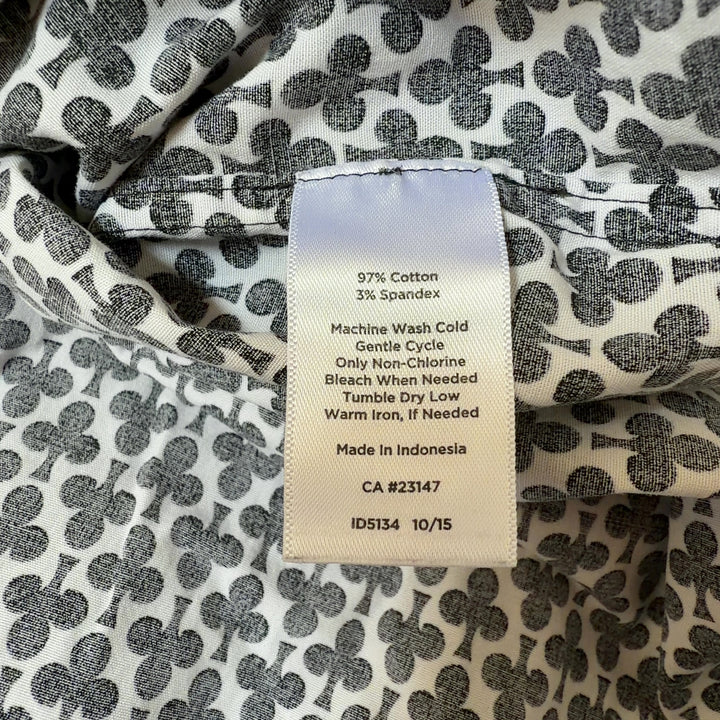 Black and white geometric print button-up shirt, back view showing full length and fit