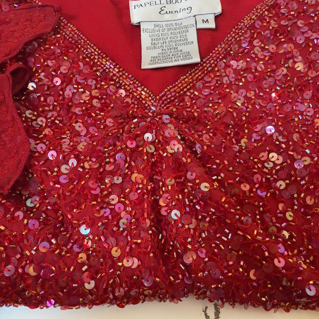 Red sequin cold shoulder top with flutter sleeves by Papell Boutique, back view