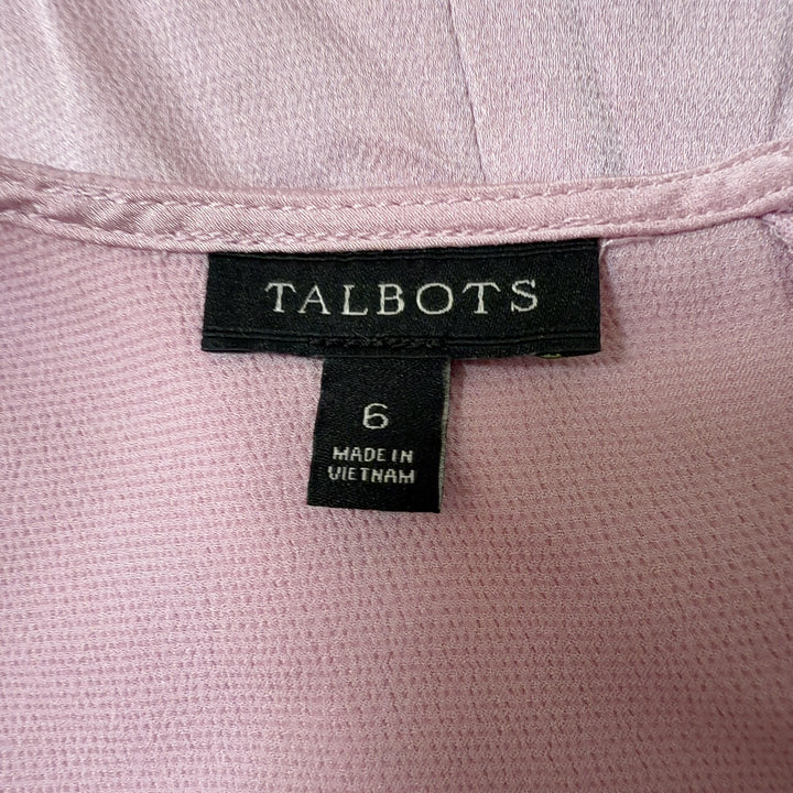 Pink tie-front long sleeve blouse back view, showing tie detail at waist