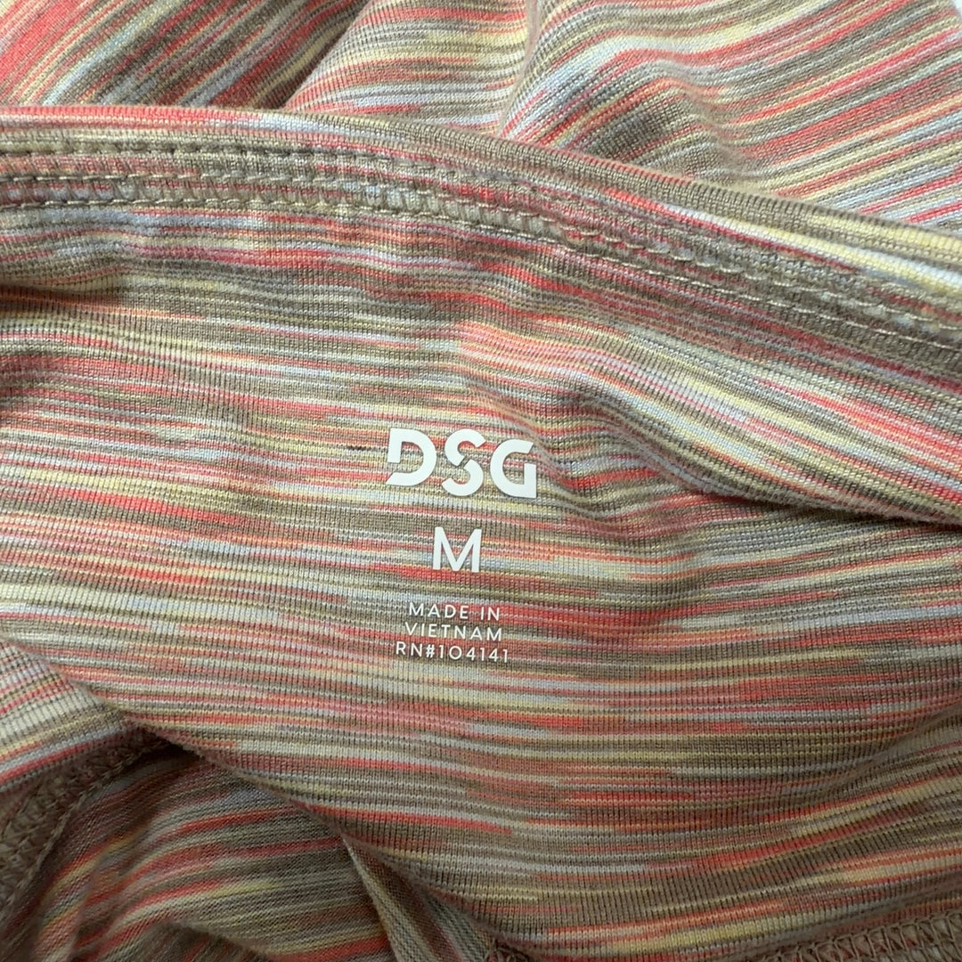 Tag view of multicolor striped athletic leggings showing fitted silhouette and stripe pattern continuity from waist to ankle