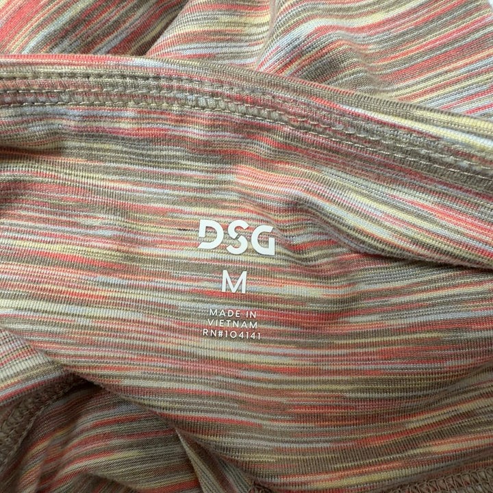 Tag view of multicolor striped athletic leggings showing fitted silhouette and stripe pattern continuity from waist to ankle