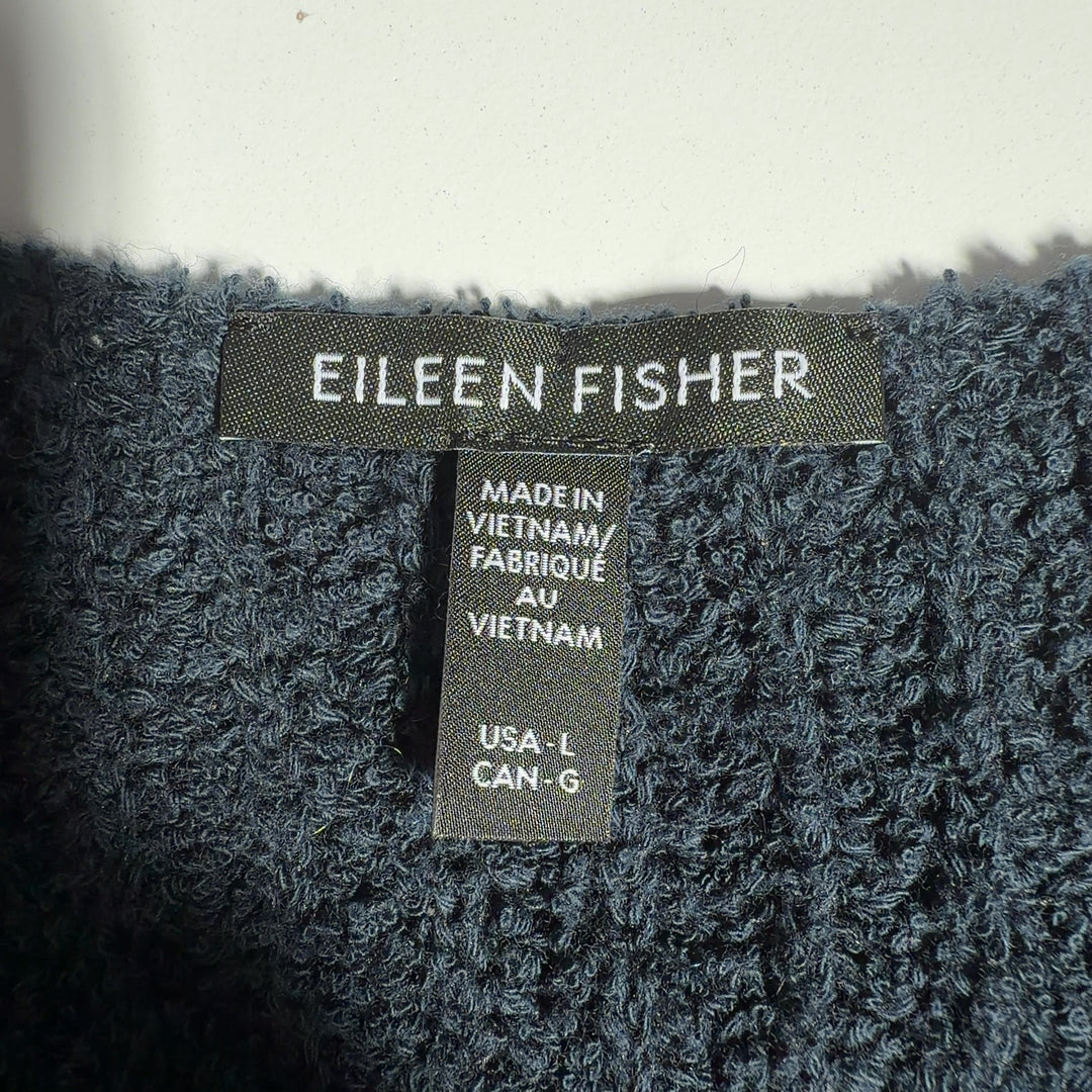 Charcoal ribbed cashmere V-neck sweater by Eileen Fisher, back view displaying the cropped length and comfortable silhouette