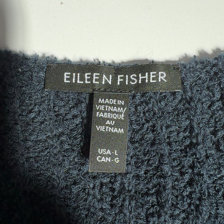 Charcoal ribbed cashmere V-neck sweater by Eileen Fisher, back view displaying the cropped length and comfortable silhouette