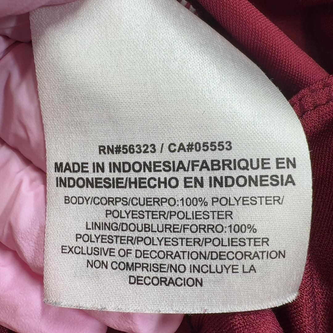 Burgundy Nike athletic shorts back view showing relaxed fit and athletic design