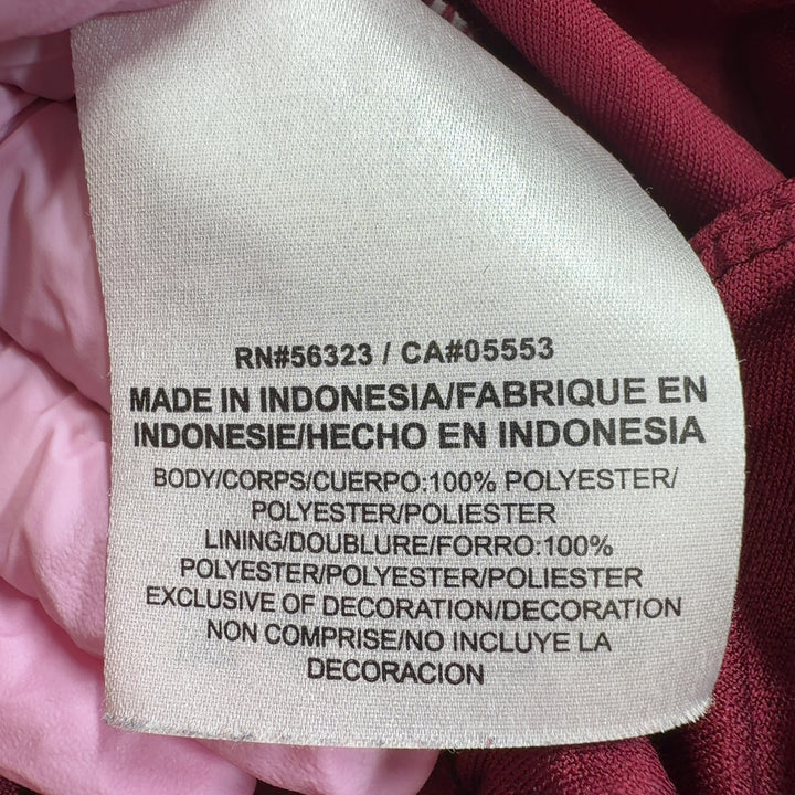 Burgundy Nike athletic shorts back view showing relaxed fit and athletic design