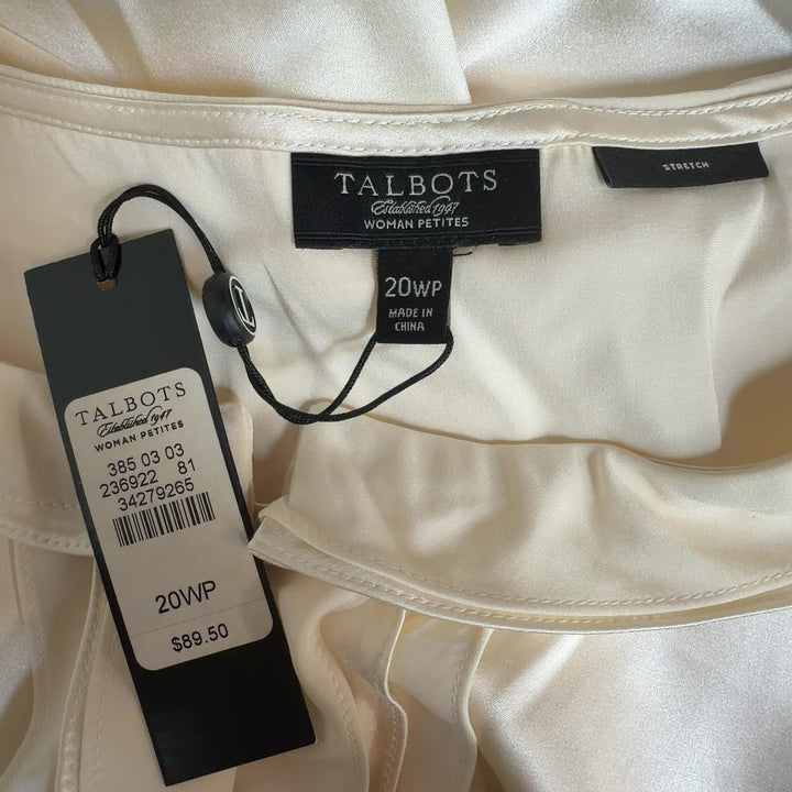 Cream silk sleeveless top back view, showing relaxed fit and center placket detail