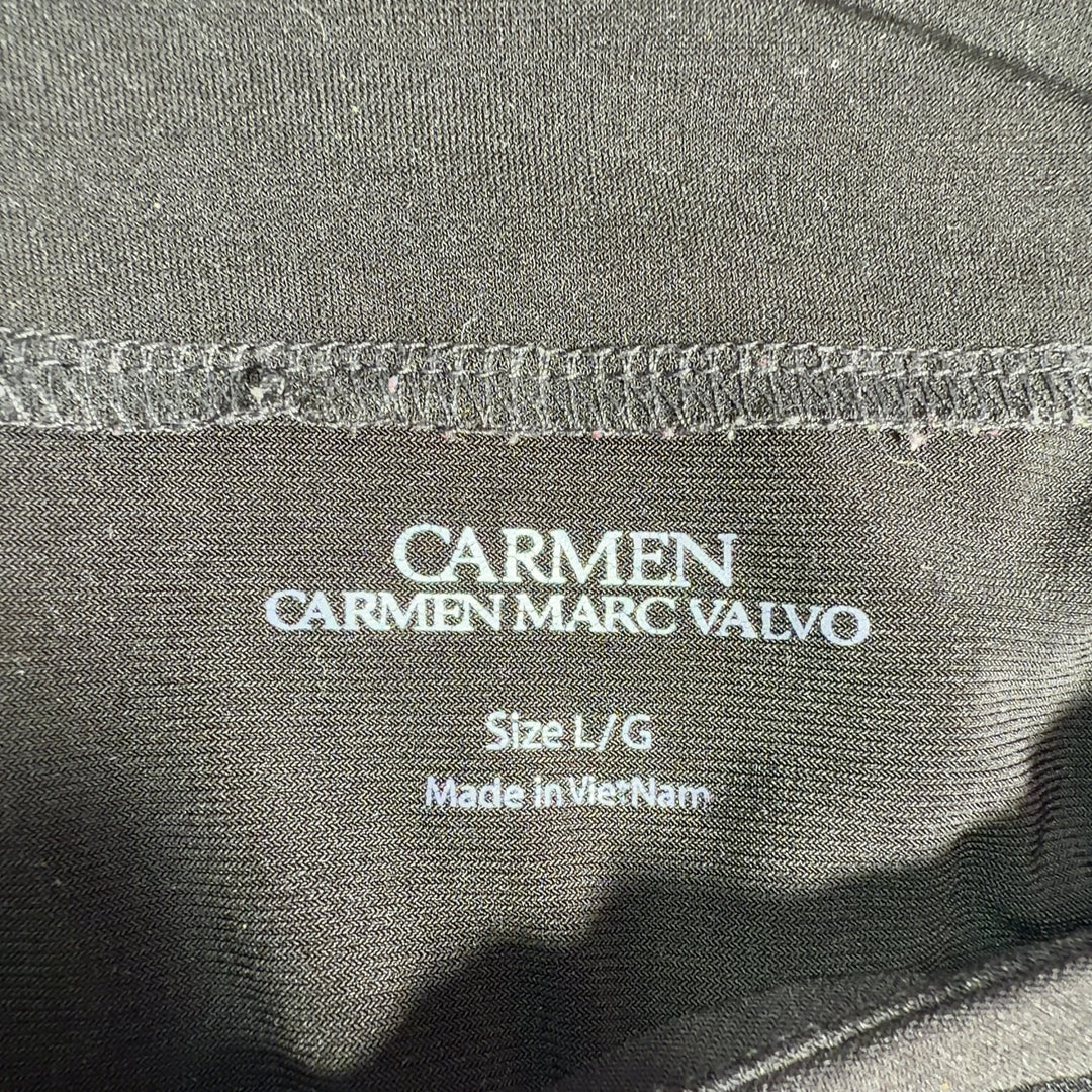 Black V-neck long sleeve top with sheer mesh sleeves by Carmen Marc Valvo, back view