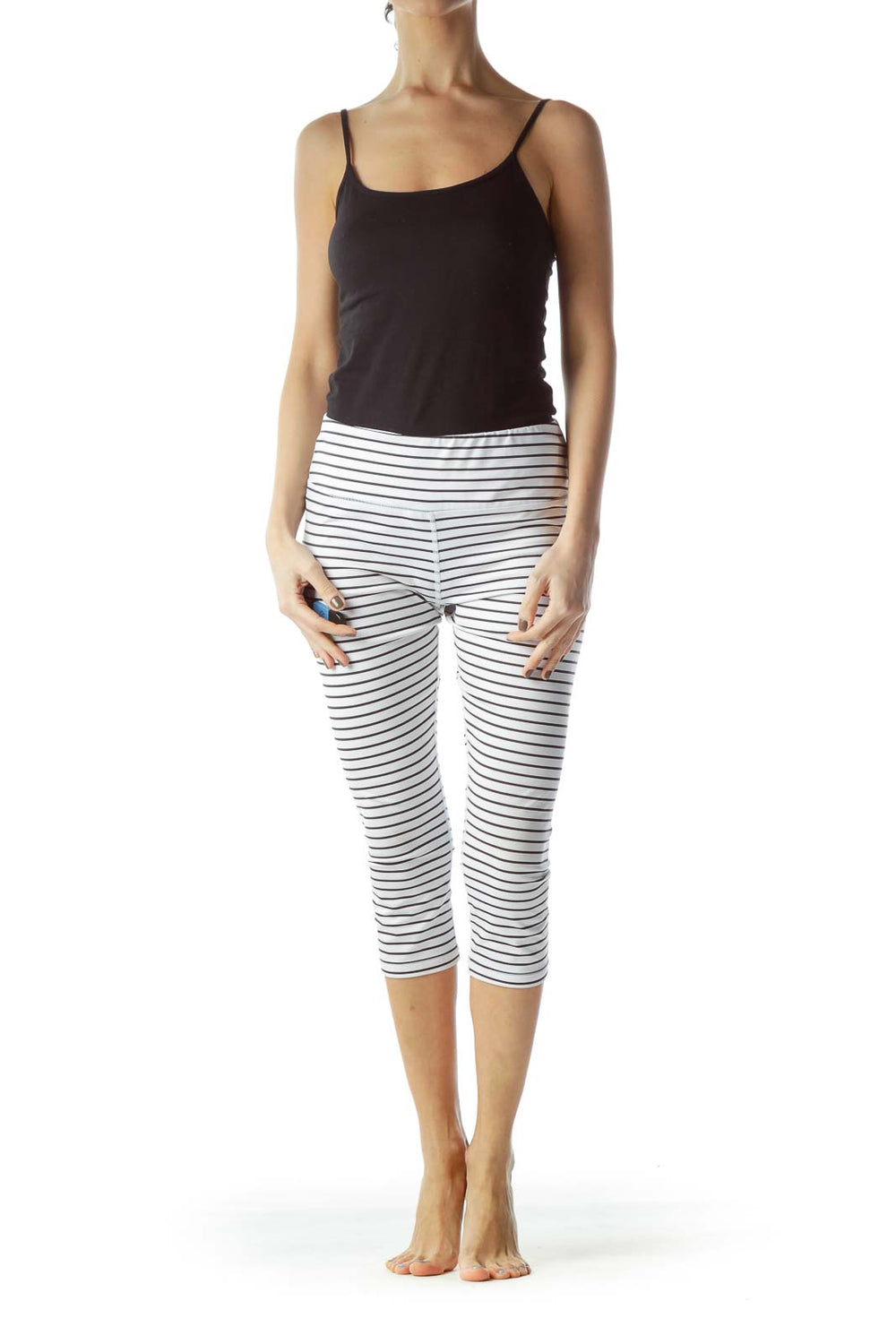 Front view of Scorpio Sol white striped capri leggings