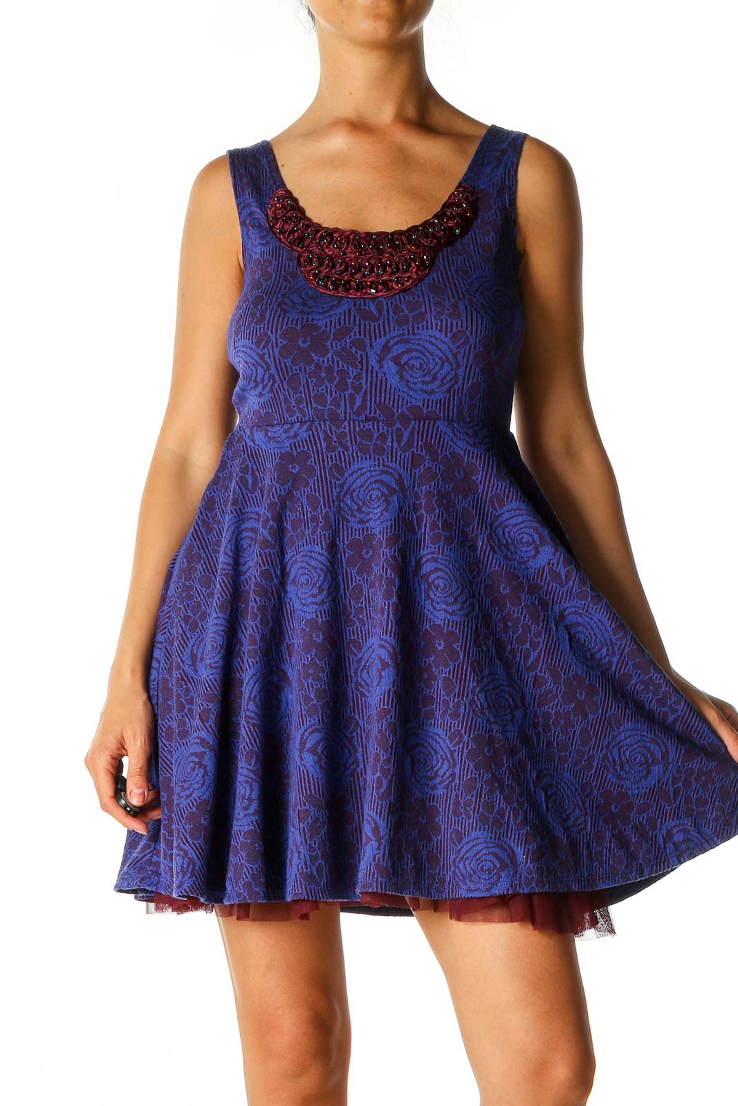 Front view of Free People blue floral fit-and-flare mini dress with beaded neckline