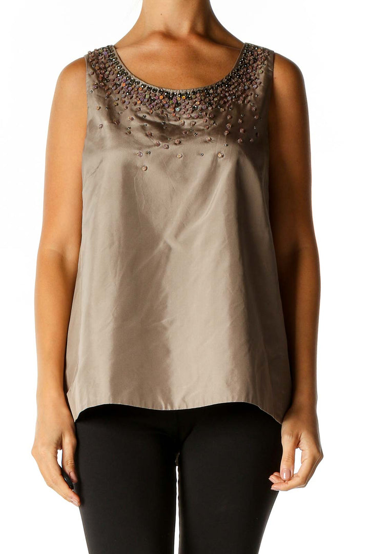 Front view of J.Crew taupe sleeveless blouse with beaded neckline embellishment