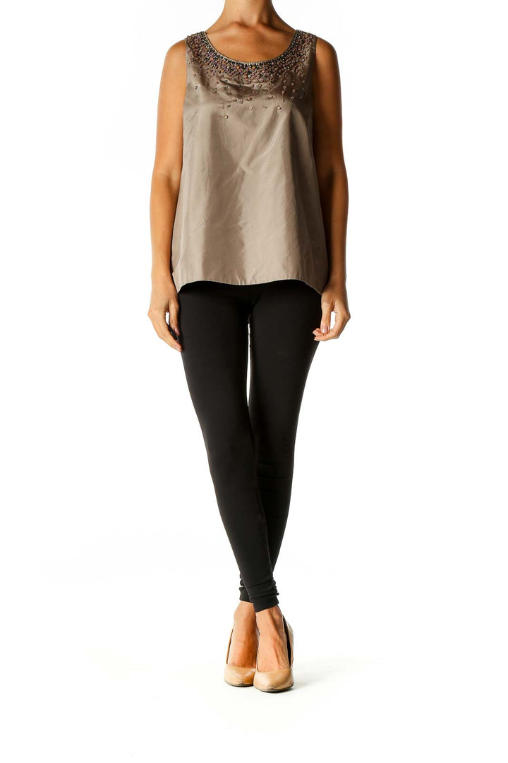 Front view of J.Crew taupe sleeveless blouse with beaded neckline embellishment