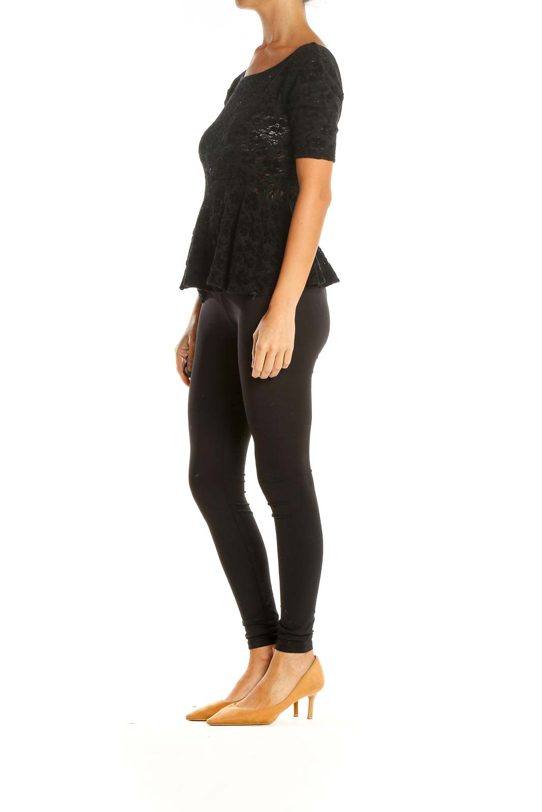 Front view of Free People black lace peplum top with scoop neckline