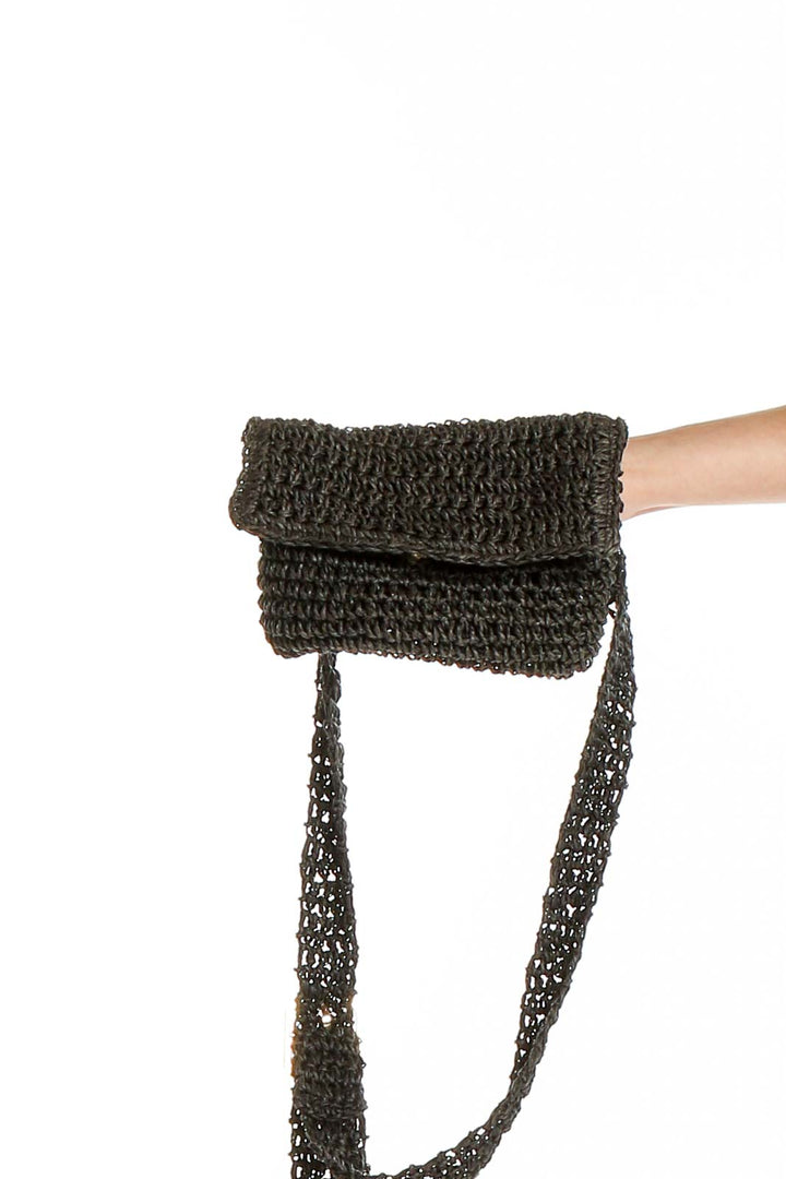 Front view of Society Amuse black crochet crossbody bag with foldover design