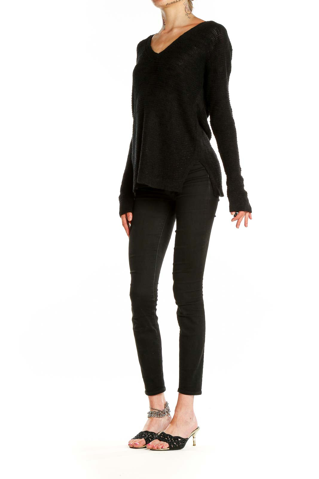 Front view of Banana Republic black V-neck knit sweater on model