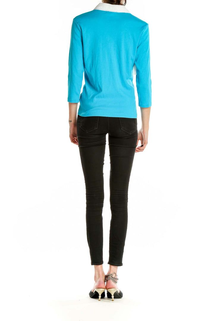 Side view of Lauren Ralph Lauren turquoise 3/4 sleeve polo top on model