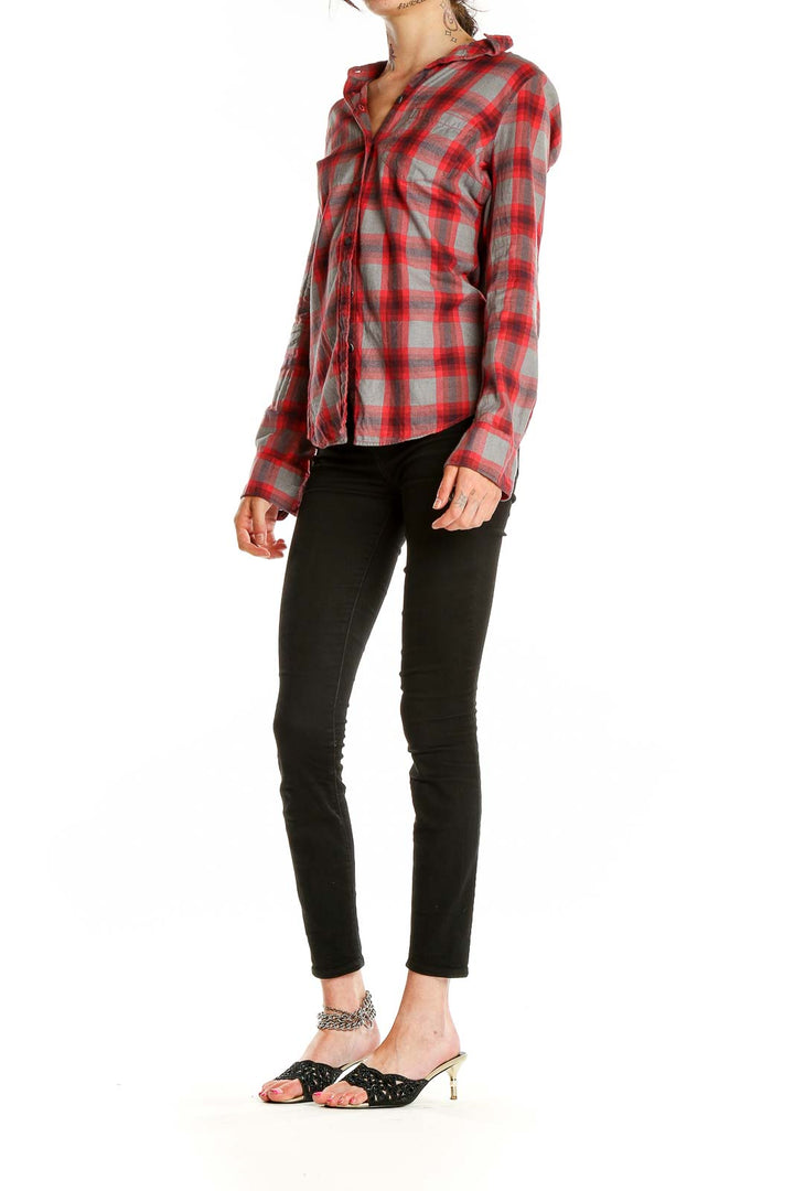 Front view of J.Crew red plaid button-down shirt on model