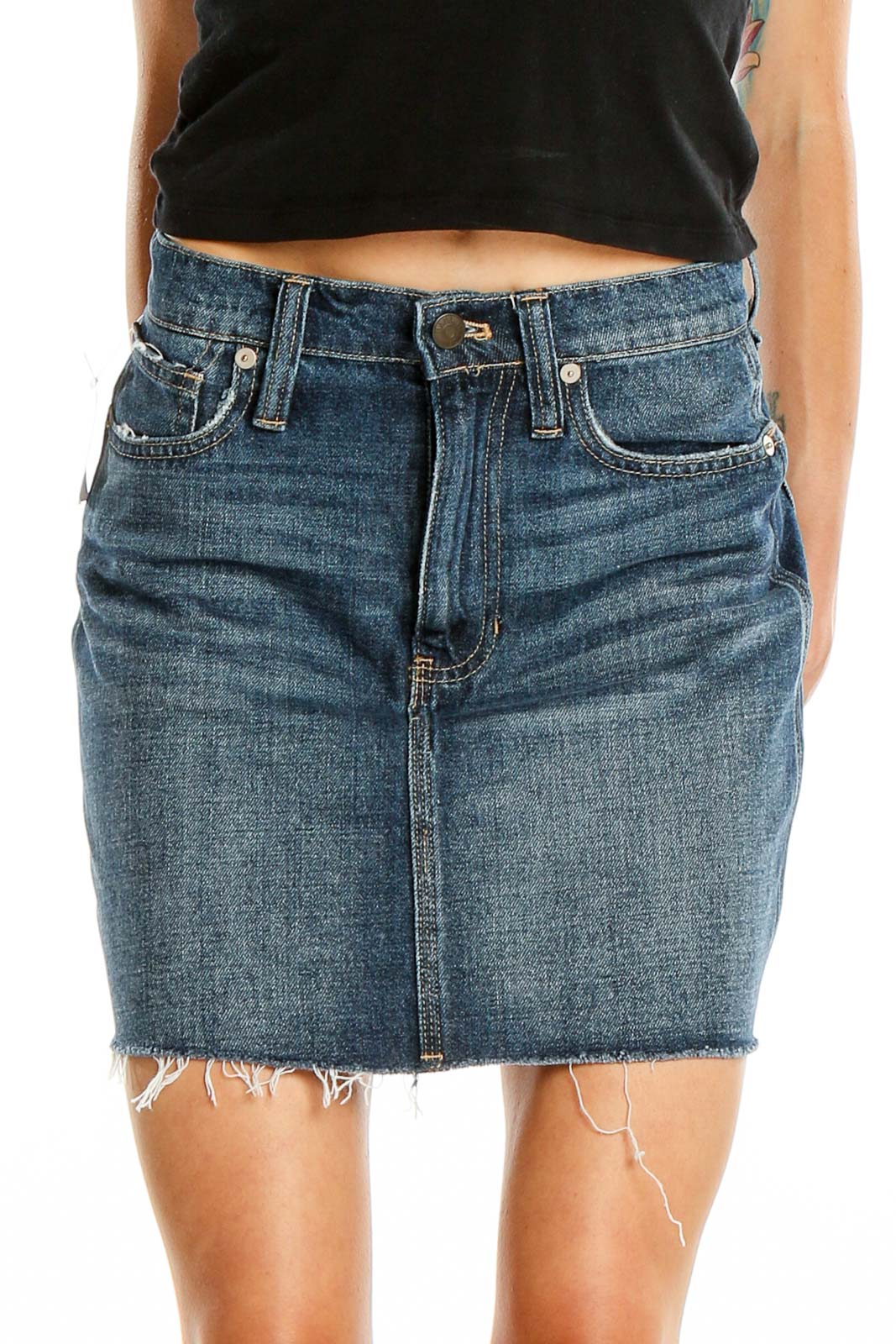 Front view of Madewell blue denim mini skirt with raw hem