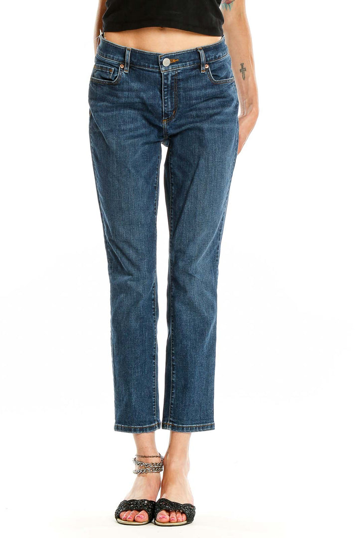 Front view of LOFT blue cropped straight leg jeans on model