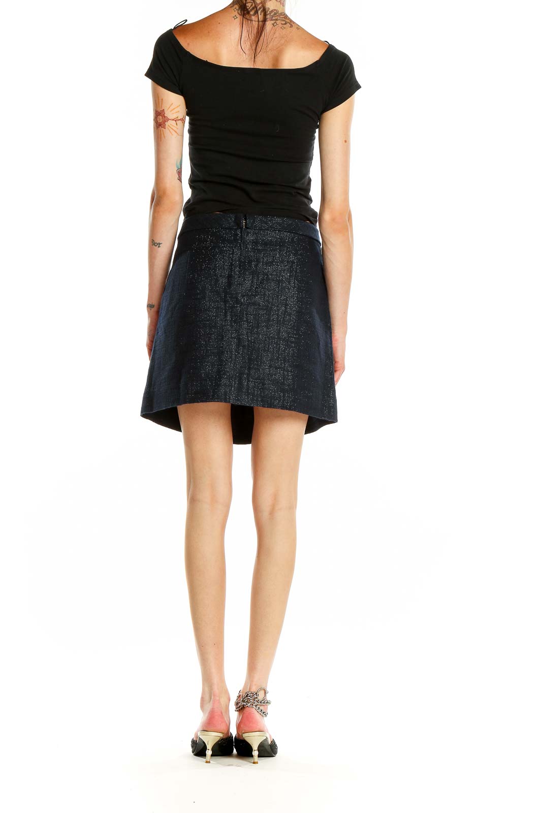 Side view of J.Crew navy textured mini skirt with model