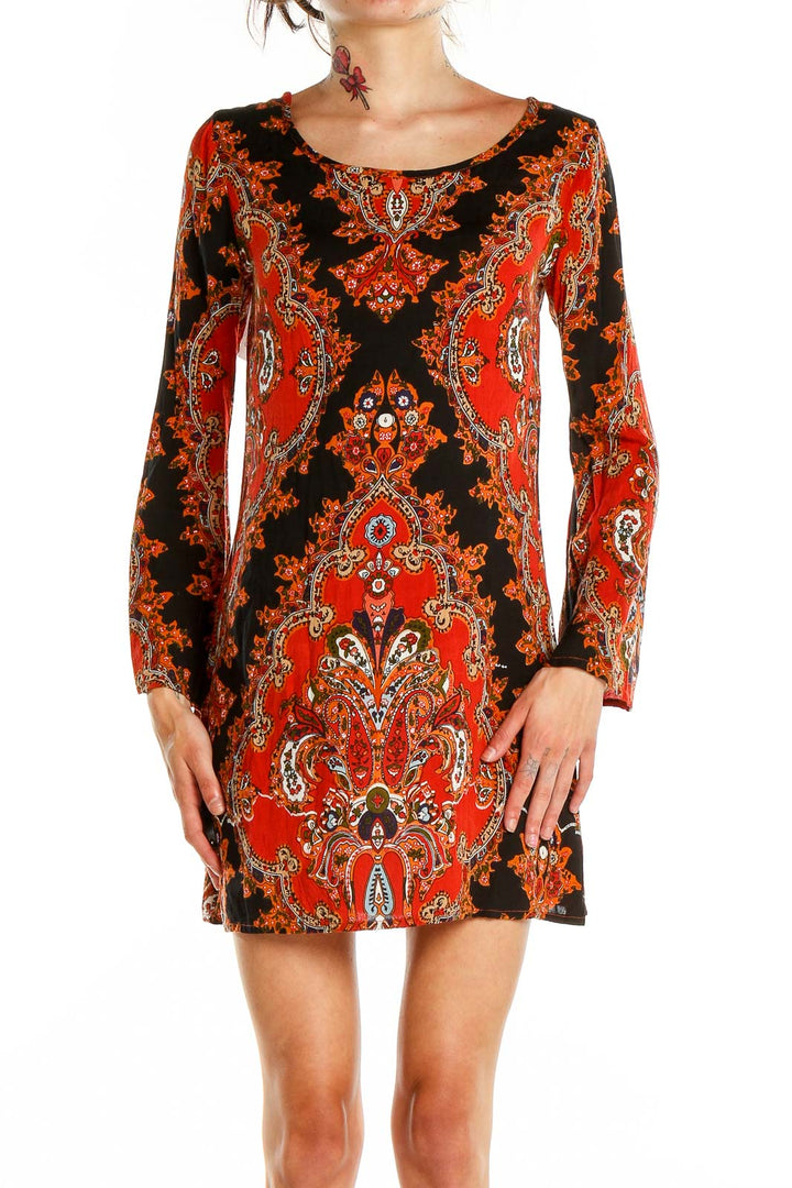 Front view of Raga red paisley print long sleeve mini dress