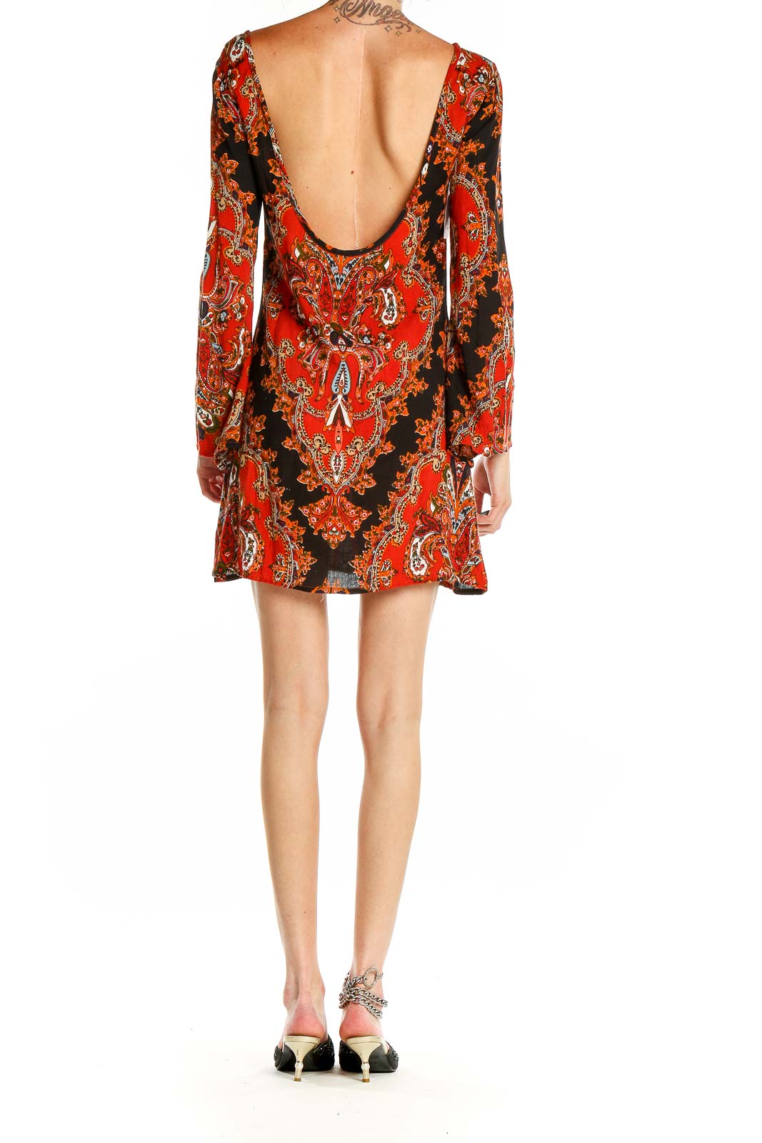 Side view of Raga red paisley print long sleeve mini dress