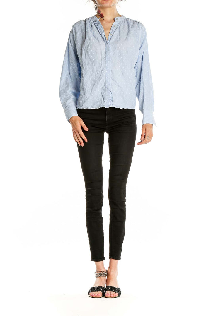 Front view of Joie light blue textured button-up blouse with gathered shoulders