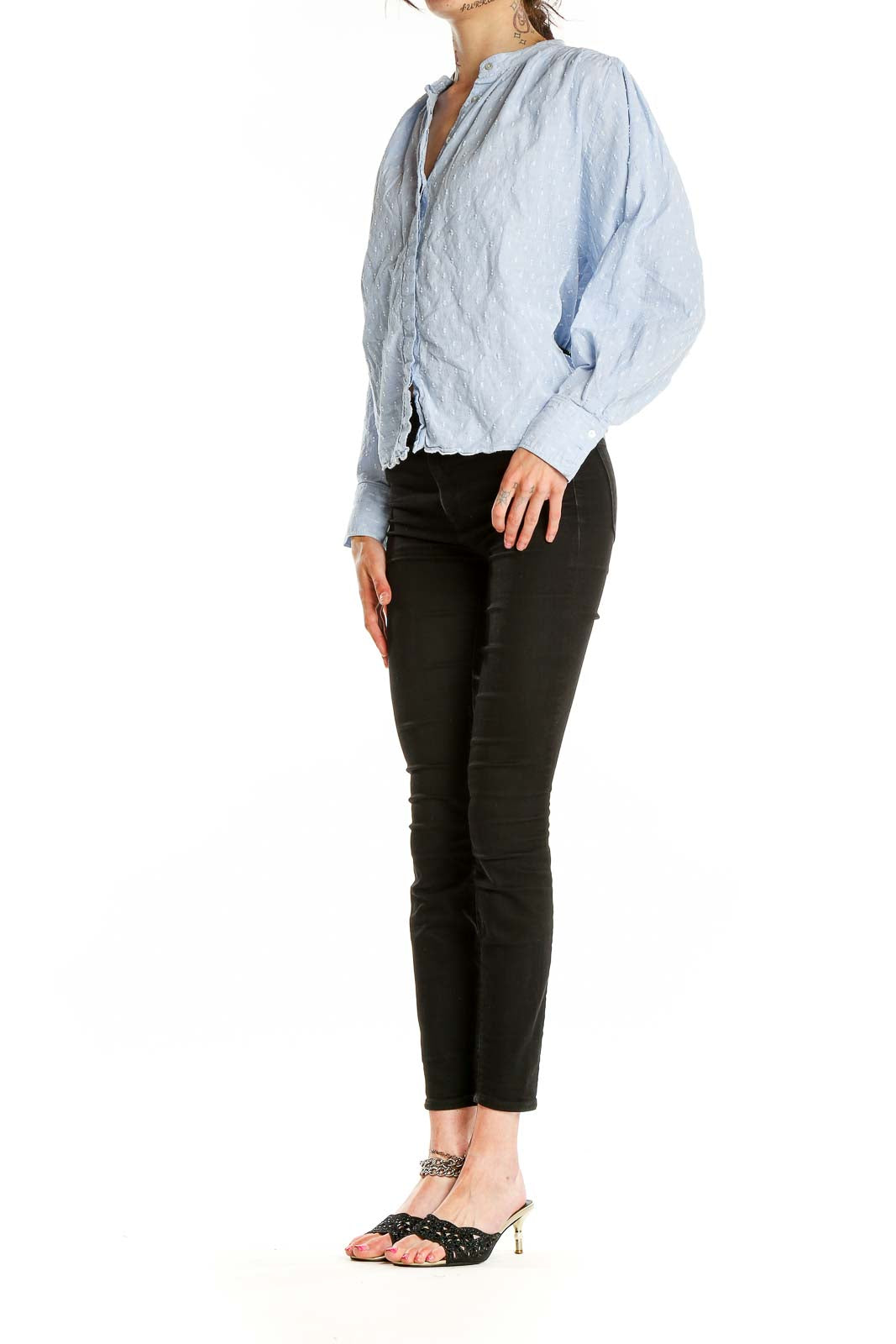 Front view of Joie light blue textured button-up blouse with gathered shoulders