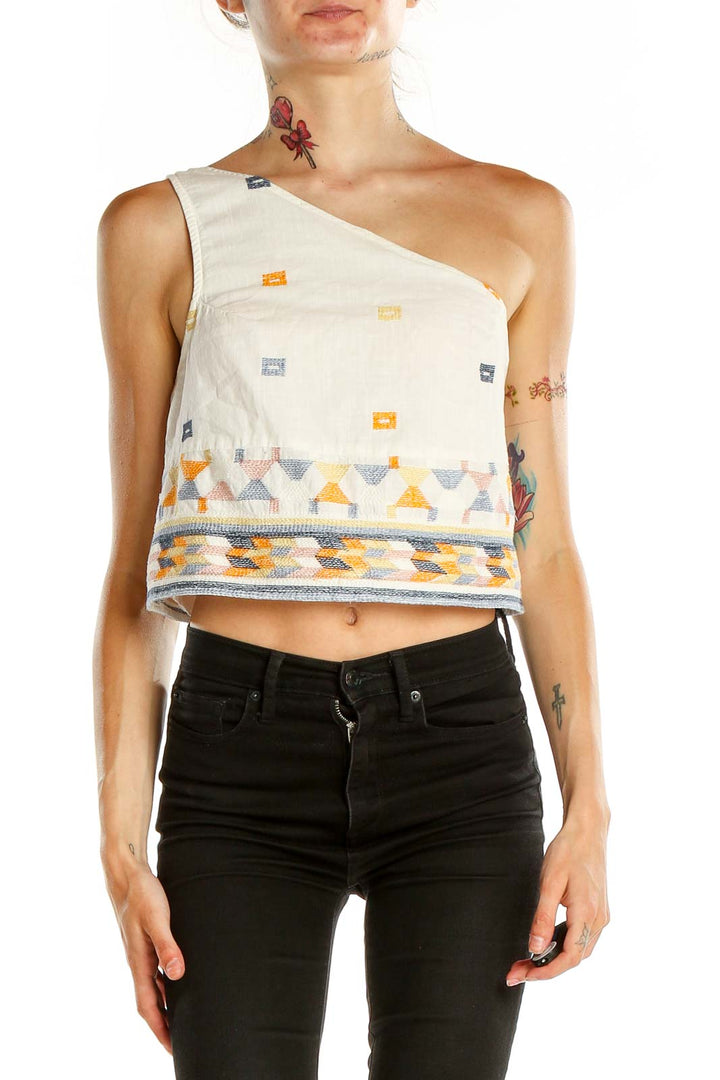 Front view of Free People white one-shoulder embroidered crop top