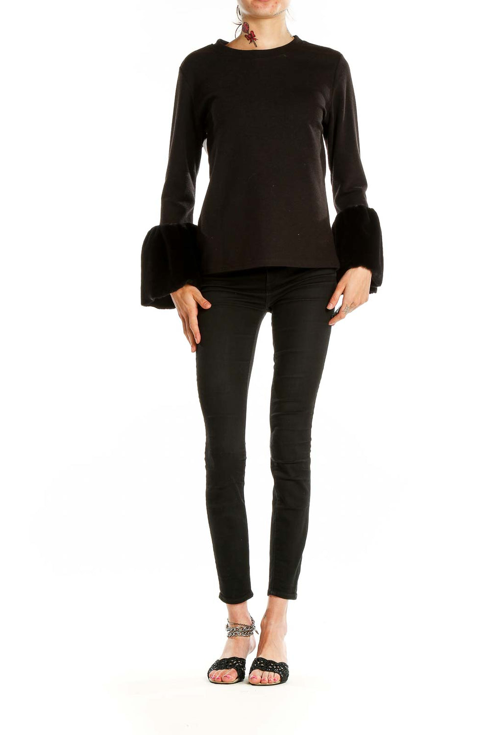 Front view of Beulah black knit sweater with fur cuffs