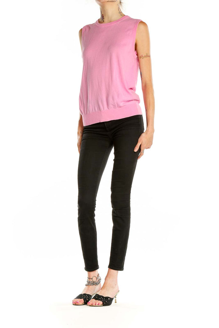 Front view of J.Crew pink sleeveless knit top on model