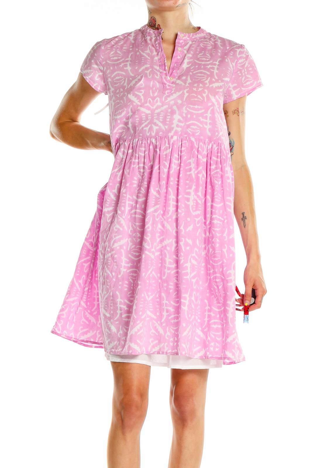 Front view of Ro's Garden pink floral print babydoll dress with V-neck and short sleeves