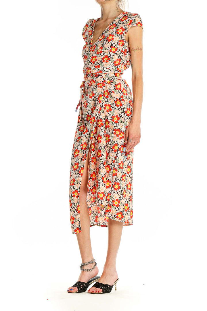 Front view of J.Crew Mercantile orange floral wrap midi dress on model