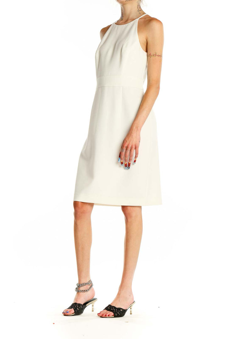 Front view of white halter neck sheath dress from Banana Republic