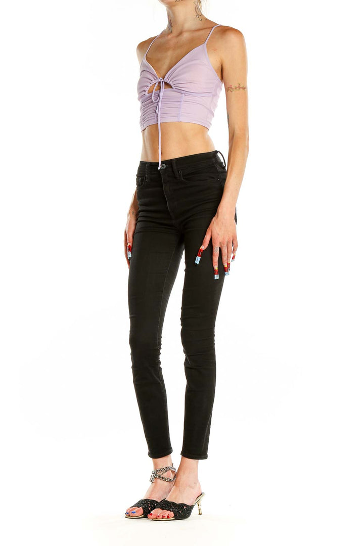 Front view of lavender ruched crop top with tie-front detail